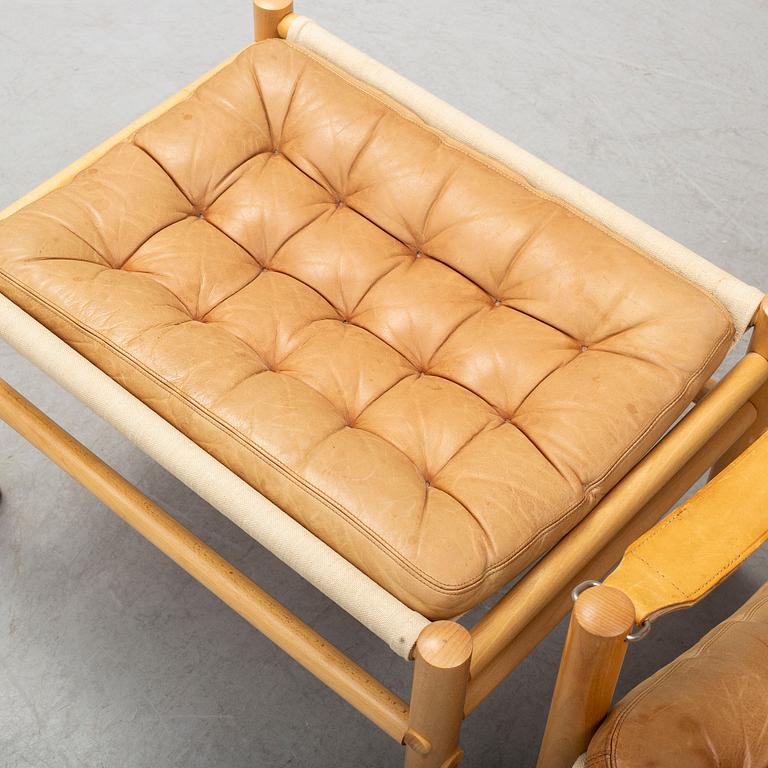 BROR BOIJE, a 'Junker' leather covered easy chair and ottoman from Dux.