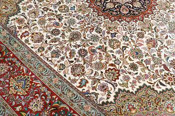 A part silk Tabriz carpet, sk 50 Radj, ca 312 x 296 cm.
