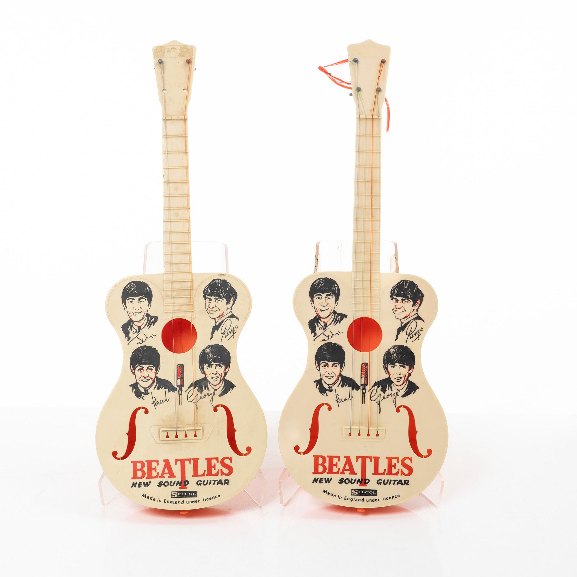 The Beatles, "New Sound Guitar", toy guitars, 2 pcs, Selcol Products Limited, England. 1960s.
