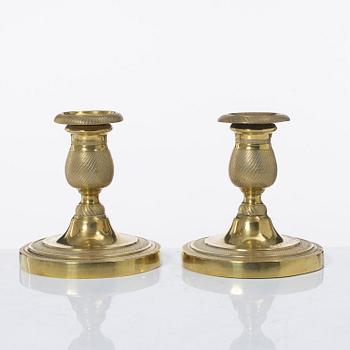 A pair of candle sticks, Empire, France, first half of the 19th century.