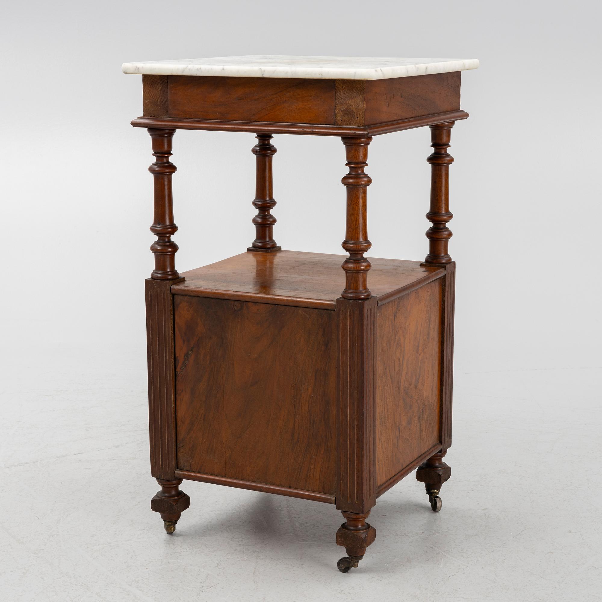 An early 20th century bedside table.