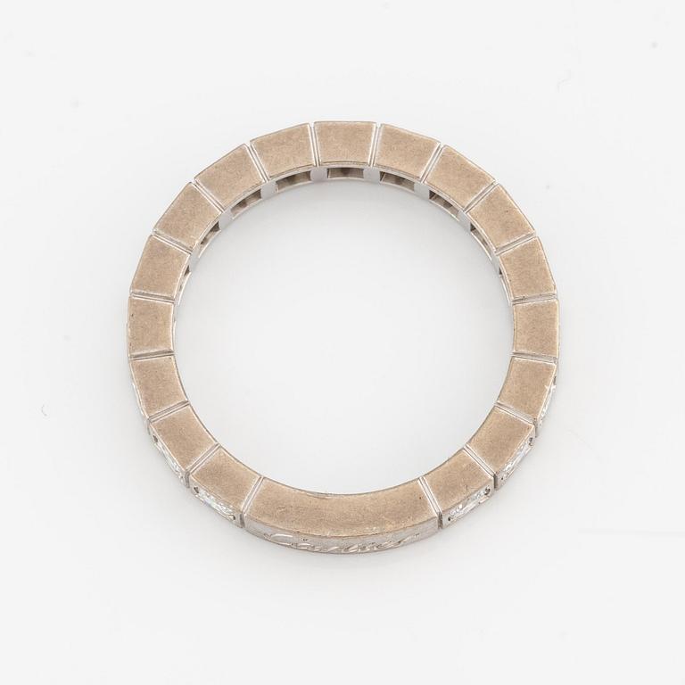 An 18K white gold Cartier ring set with round brilliant-cut diamonds.