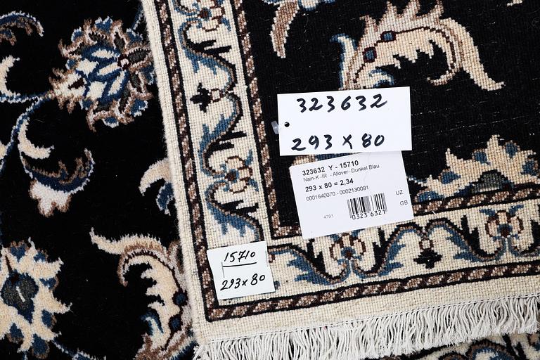 A runner carpet, Nain, part silk, ca 293 x 77 cm.