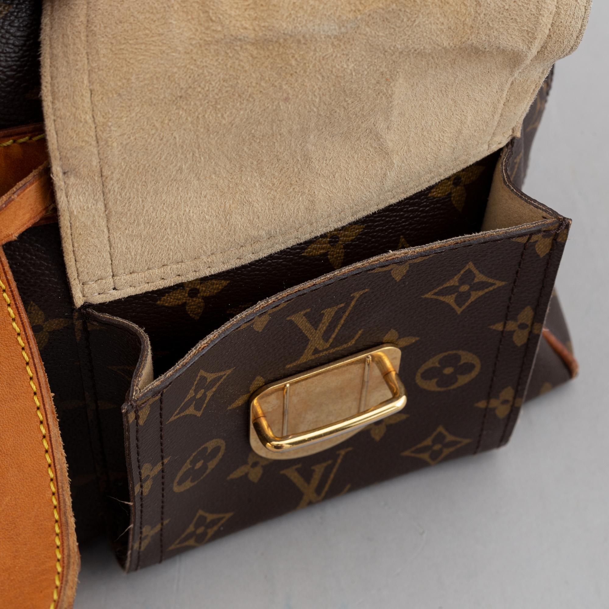 Louis Vuitton, a monogram canvas handbag.