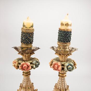 A pair mid 20th century wood candle sticks from Paoletti, Firenze Italy.