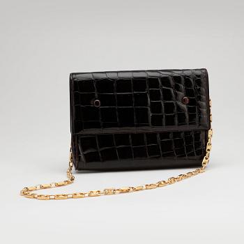 CÉLINE, a brown crocodile evening bag / shoulder bag with  shoulder strap.