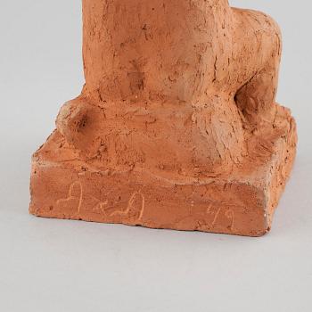 An earthenware sculpture by Axel Andersson, signed AXA and dated -49.