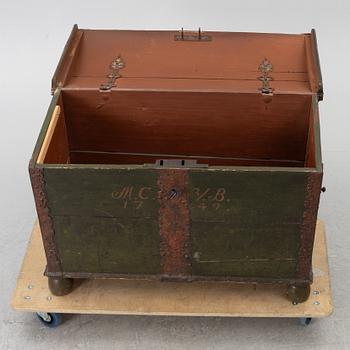 A folk art chest, dated 1749.