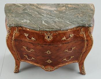 A Swedish Rococo commode attributed to J. J. Eisenbletter.