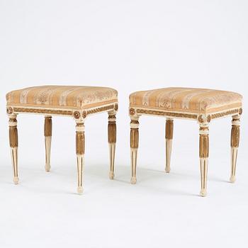 A pair of late Gustavian stools, early 19th century.