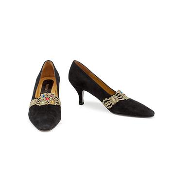 590. CHARLES JOURDAN, a pair of black suede pumps, size 7.