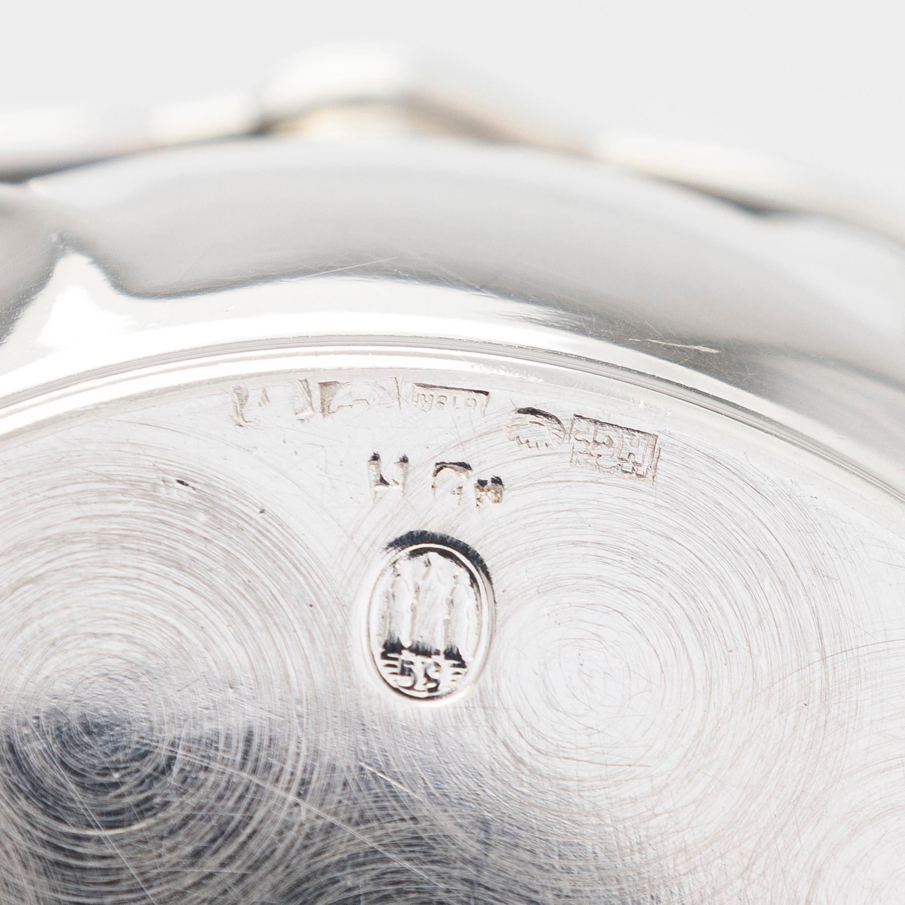 Two miniature beakers and a butter pan, Copenhagen, 1950s, and a silver-plated bottle coaster.