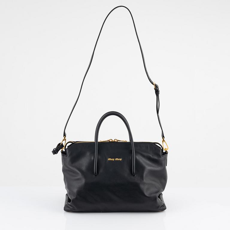 Miu Miu, a black leather handbag.