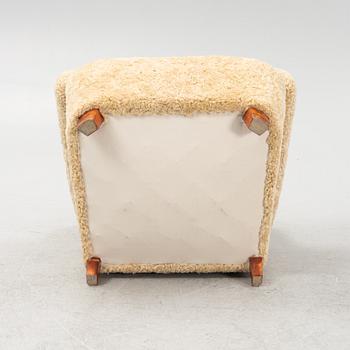 A sheepskin upholstered lounge chair, Swedish Modern, 1940s/50s.