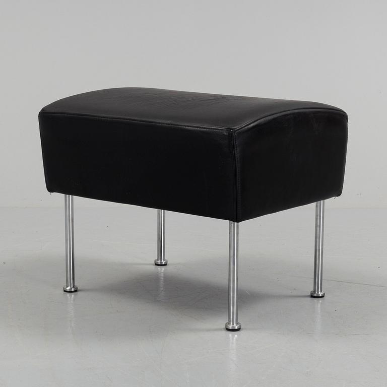 A "Cinema" footstool by Gunilla Allard.