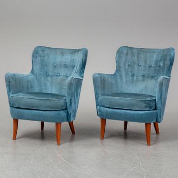 A pair of Swedish easy chairs.