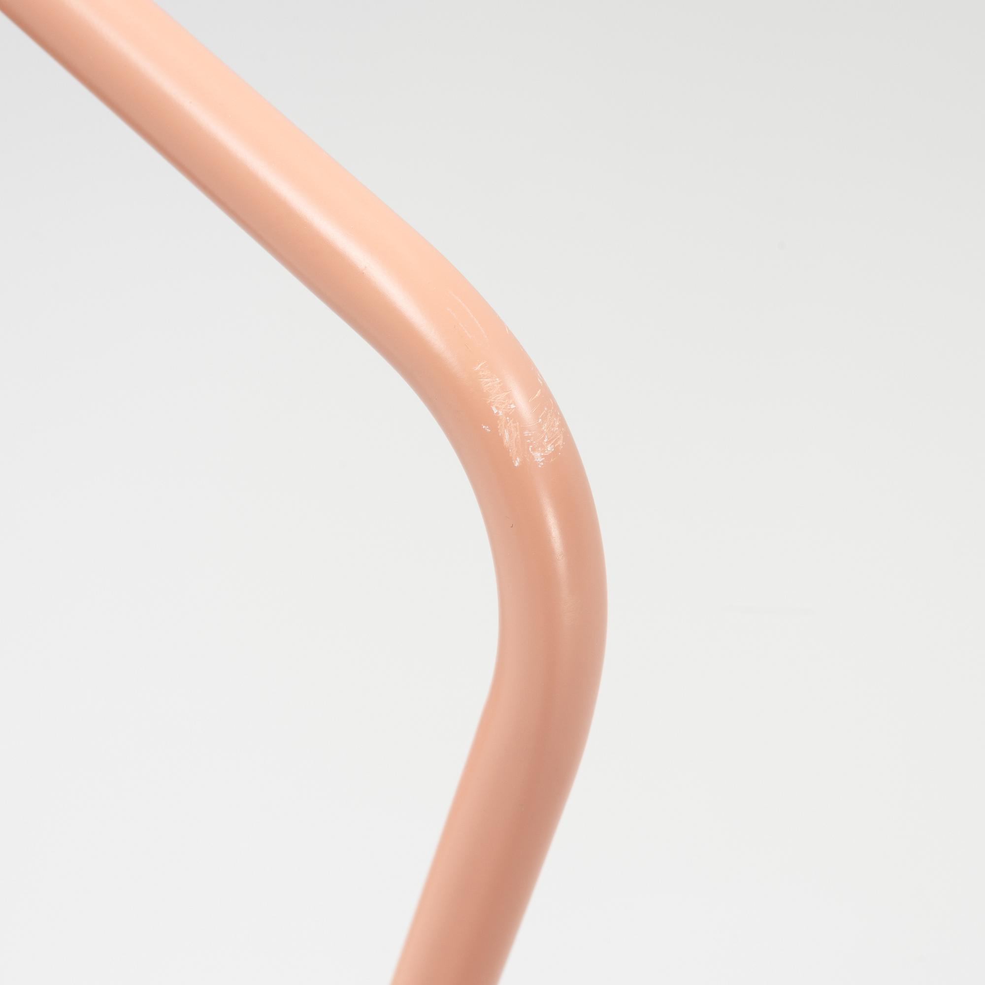 A 'Grasshopper' floorlamp by Greta Magnusson Grossman for Gubi.