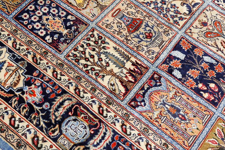 A Figural Sarouk carpet, c. 348 x 240 cm.