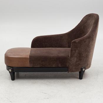 A chaise longue, contemporary.