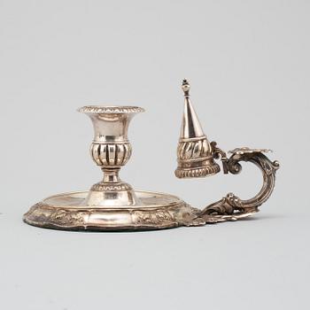 A SILVER NIGHT LIGHT HOLDER, rococo style, second half of the 19th century.