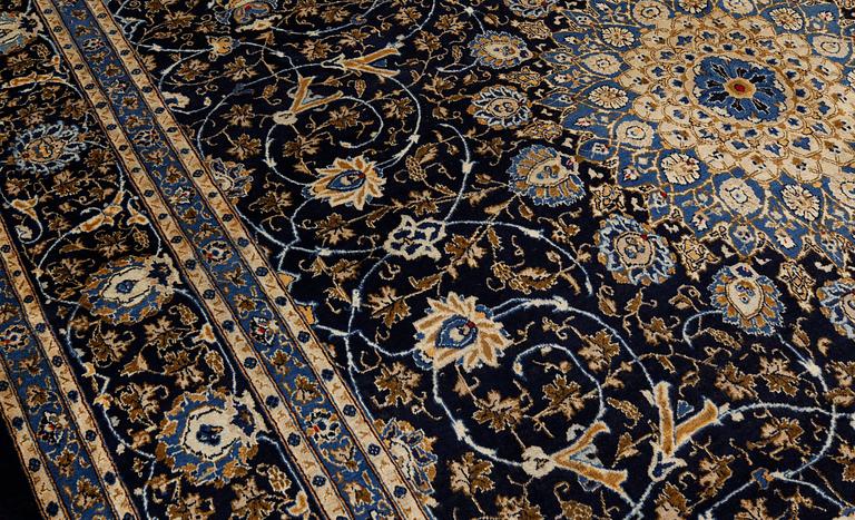 A Kashmar carpet, c. 400 x 302 cm.