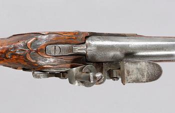 A flintlock rifle, 18th century.