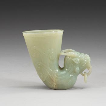 A Chinese carved nephrite rhyton beaker.