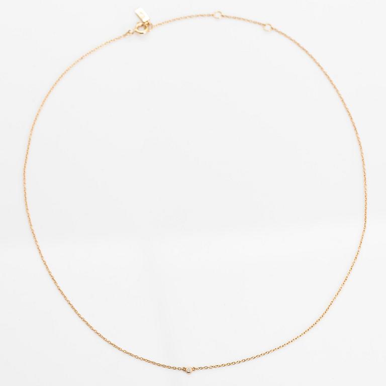 Efva Attling, an 18K gold necklace, with a small diamond, 'My first diamond necklace',