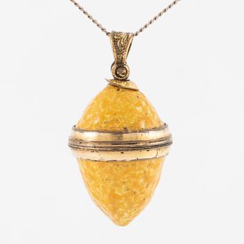 Charm in the form of a lemon with yellow enamel.