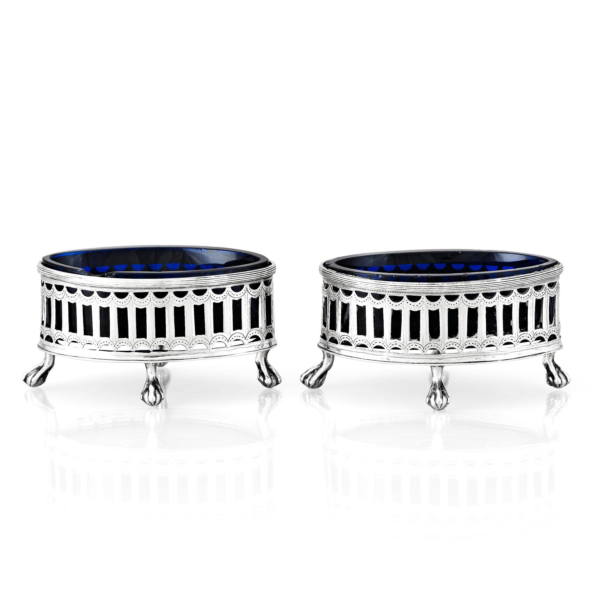 A Swedish pair of early 19th Century silver and blue glass salt cellars, mark of Pehr Zethelius, Stockholm 1808.