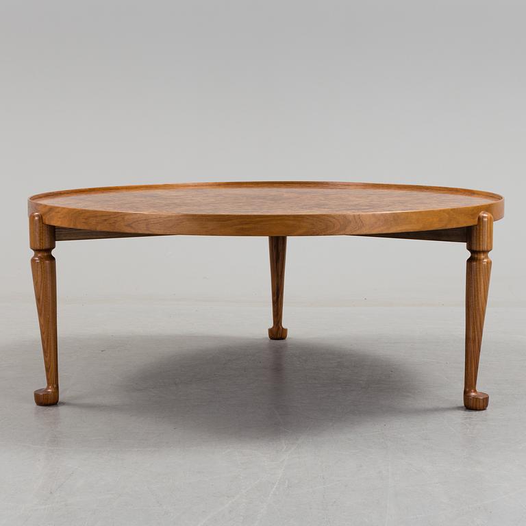 A Josef Frank walnut and burrled wood sofa table, Svenskt Tenn, model 2139.