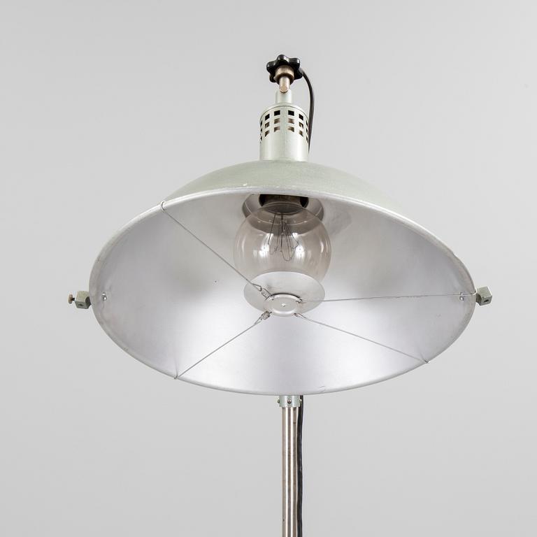 A German metal floor light from the mid 20th century.
