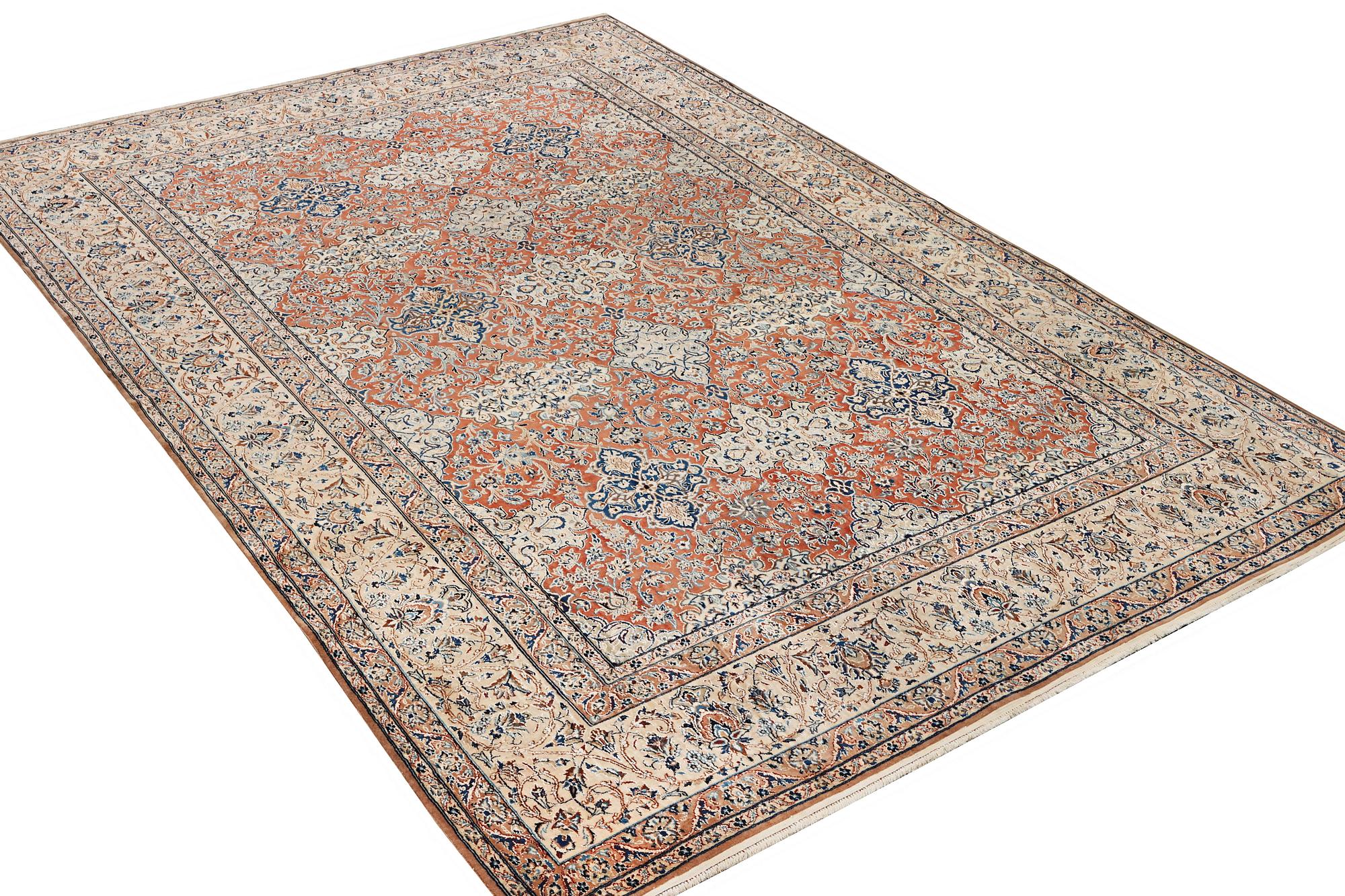 A semi-antique/old Nain carpet, part silk, c. 343 x 230 cm.