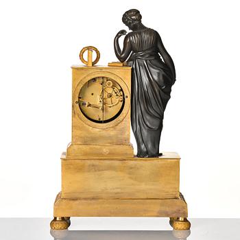 A French Empire early 19th century mantel clock, by Antoine André Ravrio.