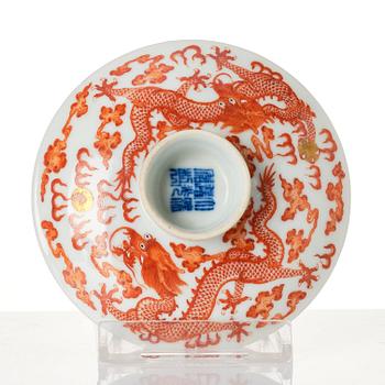 A pair of five clawed dragon bowls on stands and a cover, Qing dynasty, Daoguang mark and period (1821-50).