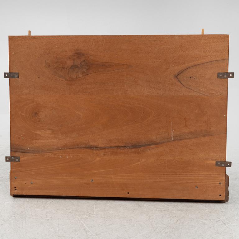A mahogany panel, 20th century.