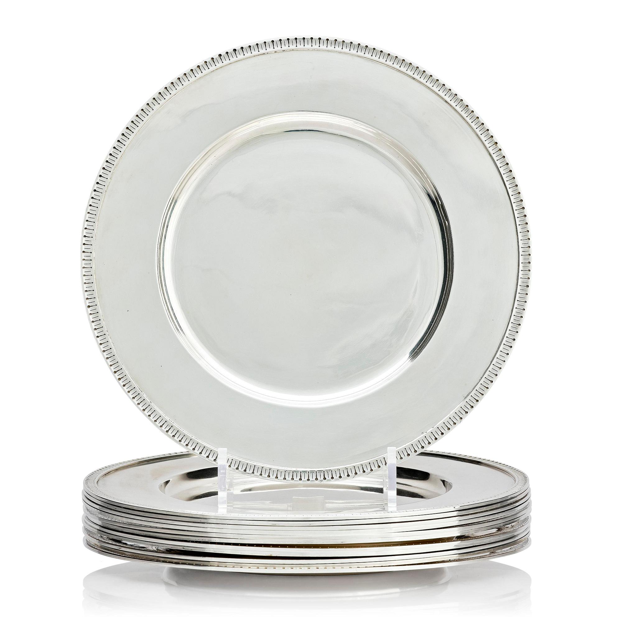 Victor Mossberg, a set of twelve silver plates, Stockholm, 1953-55.