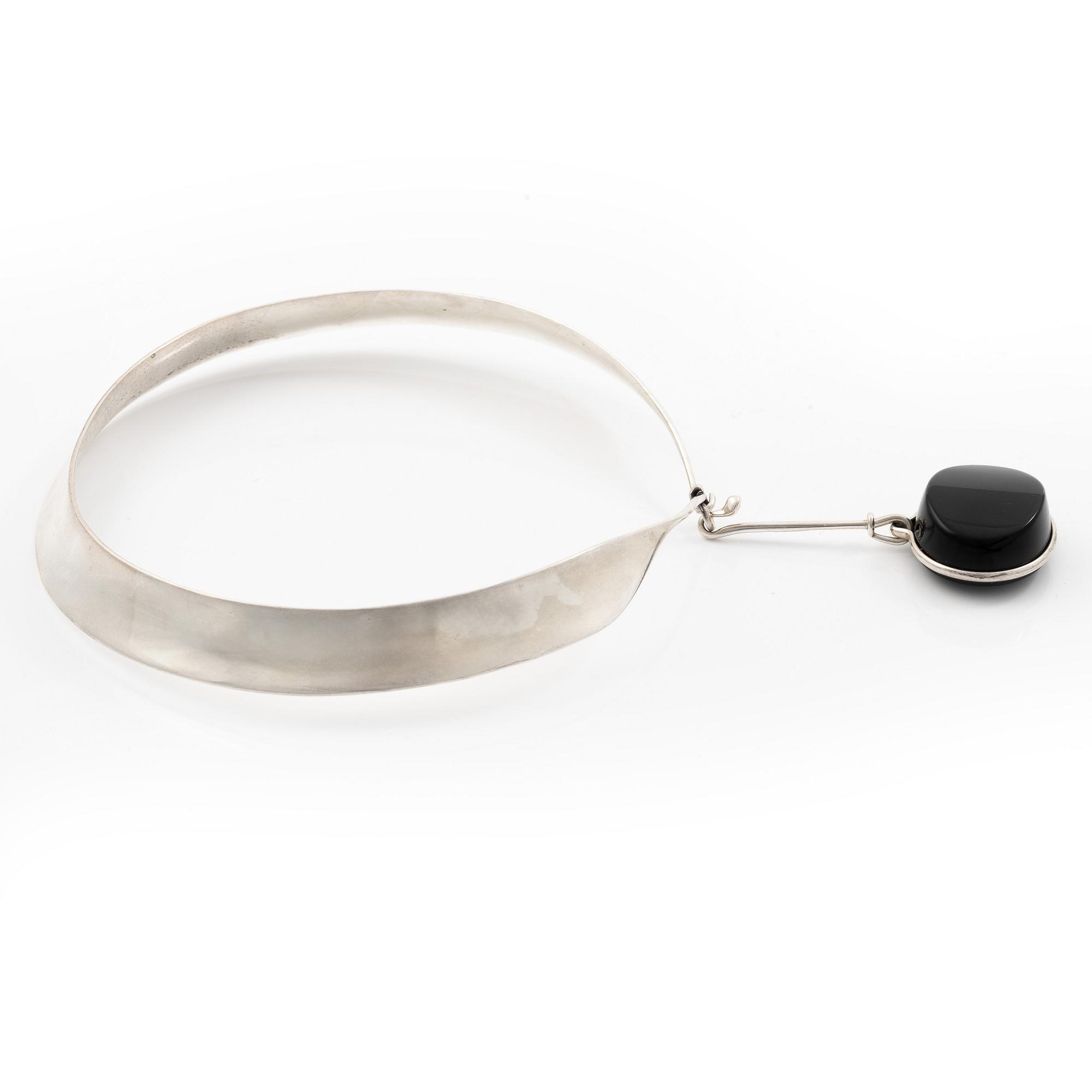 Vivianna Torun Bülow-Hübe, a sterling silver necklace with a obsidian pendant, Georg Jensen, Denmark.