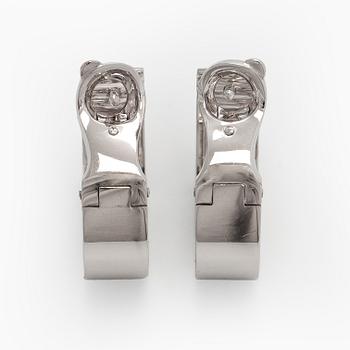 Cartier, Korvakorut, "Love", 18K valkokultaa, briljanttihiottuja timantteja.
