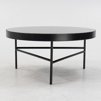 A marble top coffe table by Ferm Living, Denmark.