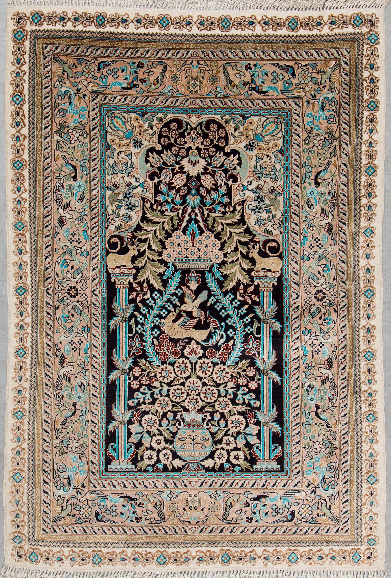 Two chinese silk rugs, around 96 x 63 and 91 x 63 cm.