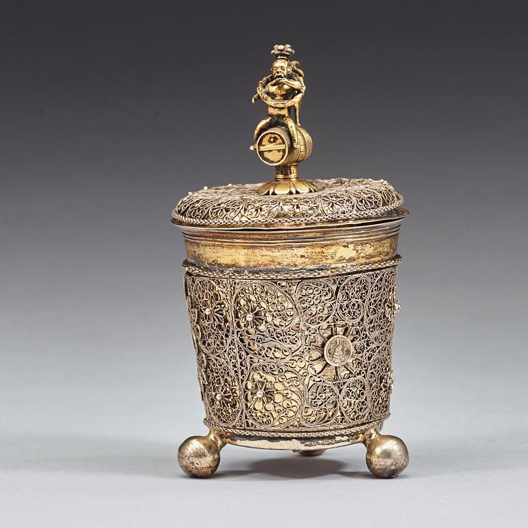 A Swedish early 18th century parcel-gilt and filigree beaker and cover, mark of J F Straub, Karlstad (-1674-1713).