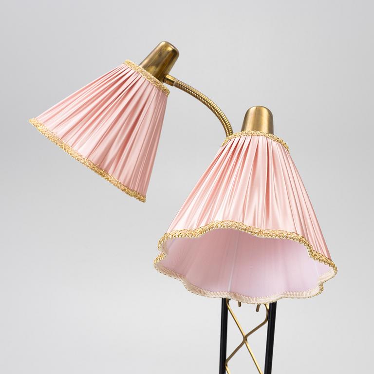 A floor lamp with table, 1940s.