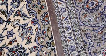 A Keshan carpet, approx. 343 x 253 cm.