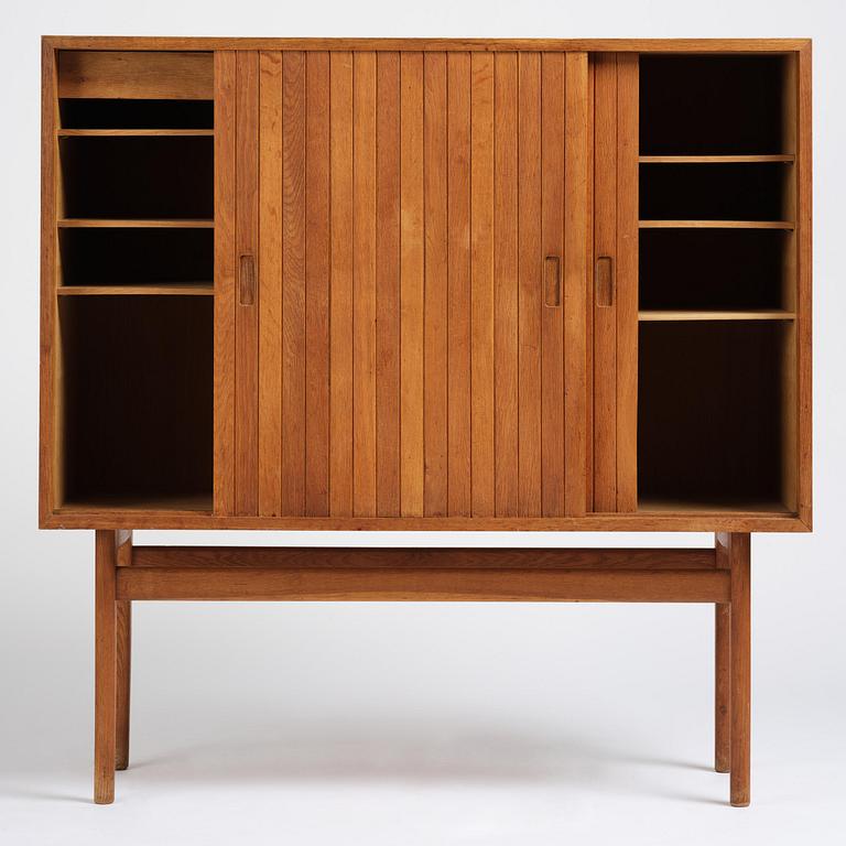 Jørgen Høj, an oak cabinet, Knud Willadsen Møbelsnedkeri, Lillerød, Denmark, 1950s.
