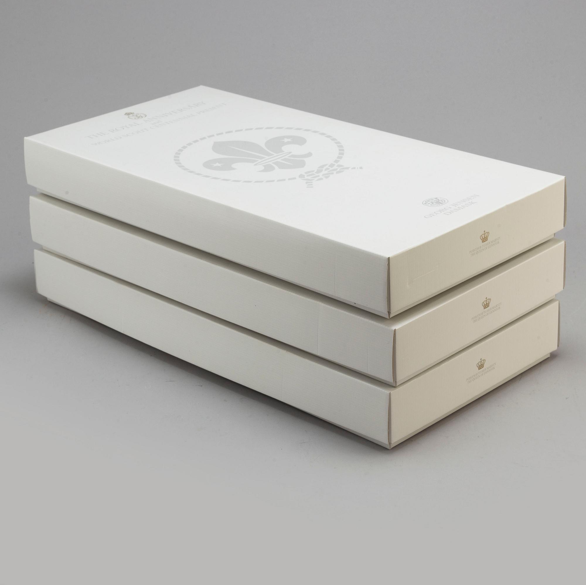 Three damasque table cloths from Georg Jensen Damask. 'The Royal Anniversary and World Scout Centennial Present'.