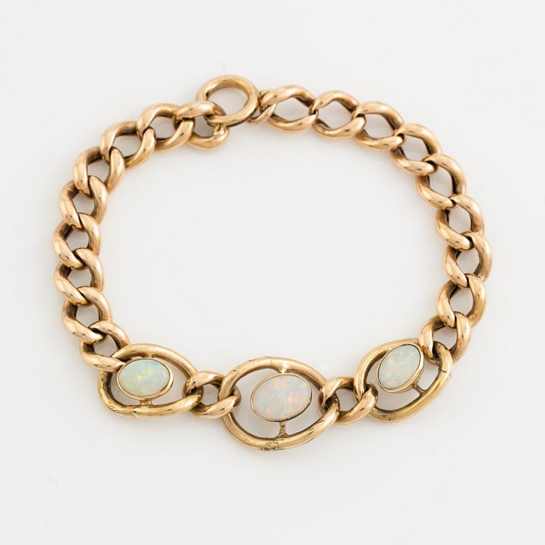 Gold and three opal bracelet.