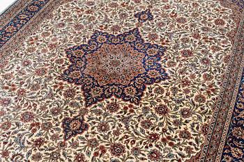 A silk Kayseri/Hereke carpet, c. 310 x 195 cm.
