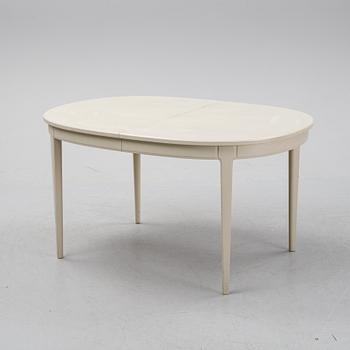 A dining table and six chairs by Carl Malmsten for Bodafors.