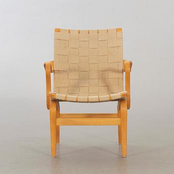 BRUNO MATHSSON, an Eva armchair.